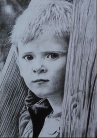 Portraitzeichnung Junge in Kohle